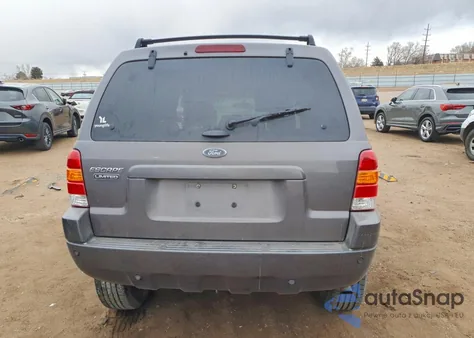 2004 Ford Escape Limited z USA, uszkodzony, nr VIN 1FMCU94134KB05937